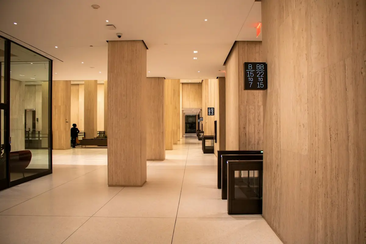 Office lobby with security turnstiles and elevators